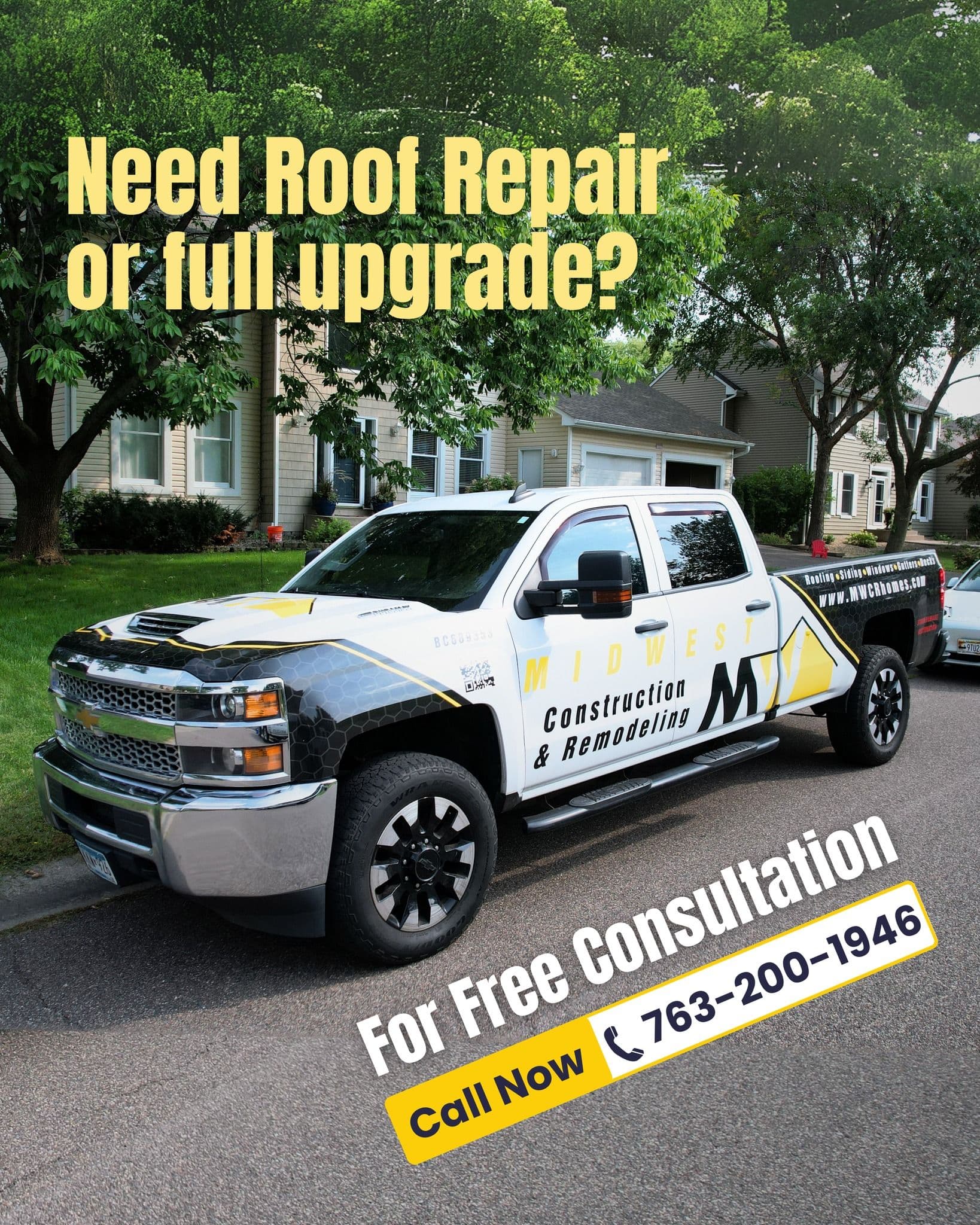 A Midwest Construction & Remodeling truck in front of a tan house advertises roof replacement or upgrade.