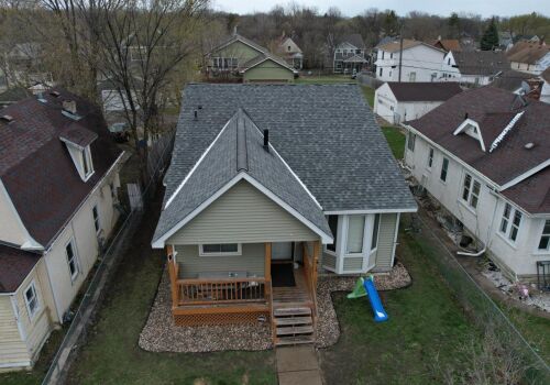 Our Big Project: Replacing Roofs, Gutters, and Siding in the City