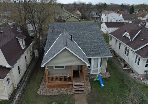 Our Big Project: Replacing Roofs, Gutters, and Siding in the City