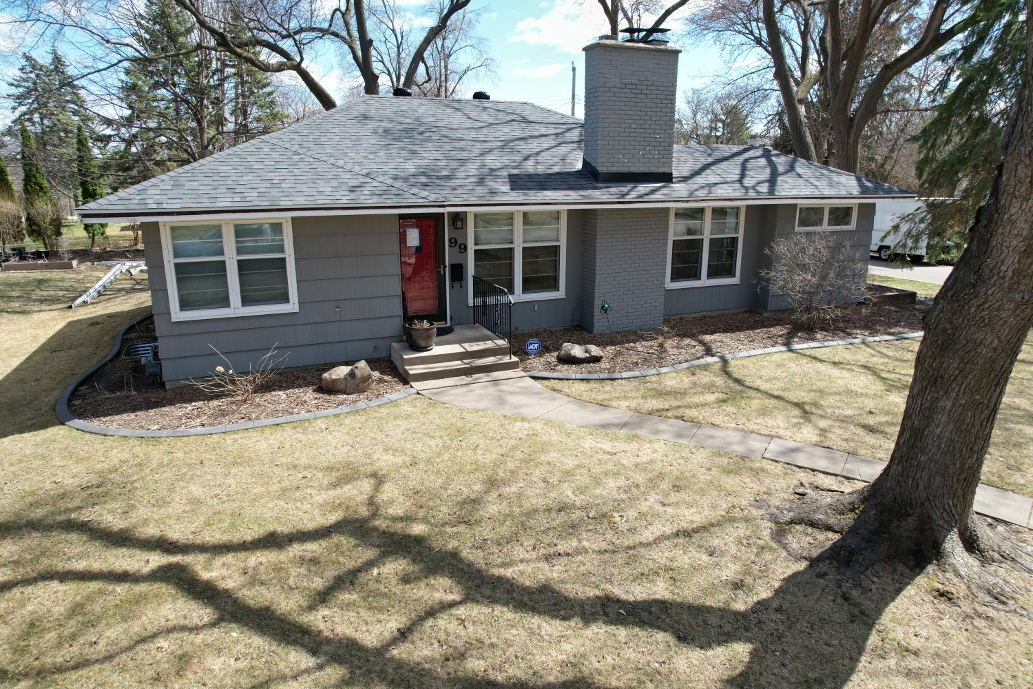 Hopkins Home Transformation: Roof, Siding, and Door Update