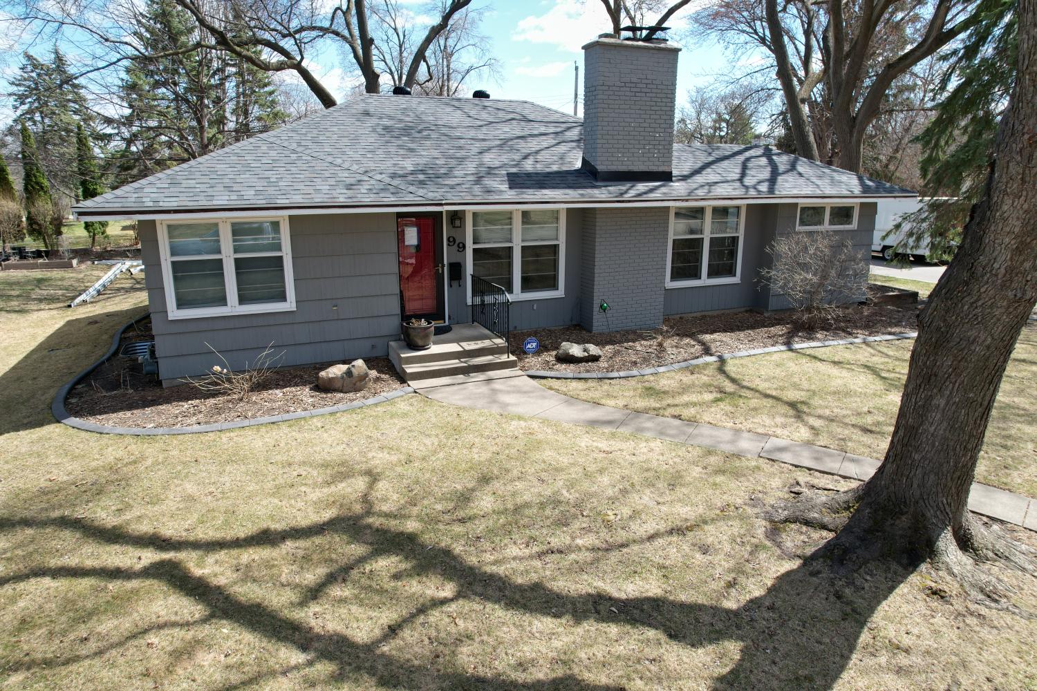 Hopkins Home Transformation: Roof, Siding, and Door Update