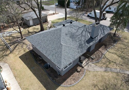 Hopkins Home Transformation: Roof, Siding, and Door Update