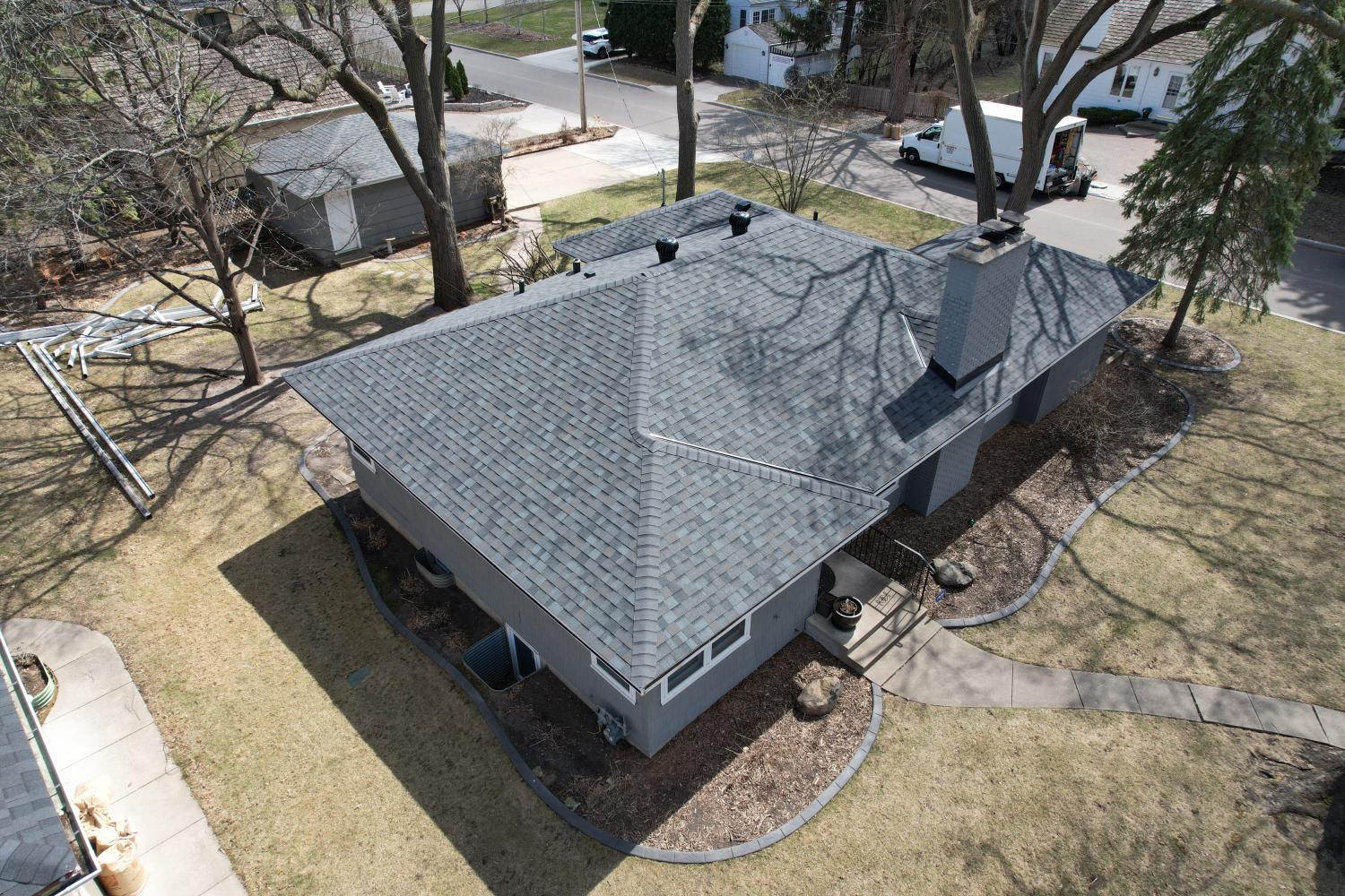 Hopkins Home Transformation: Roof, Siding, and Door Update