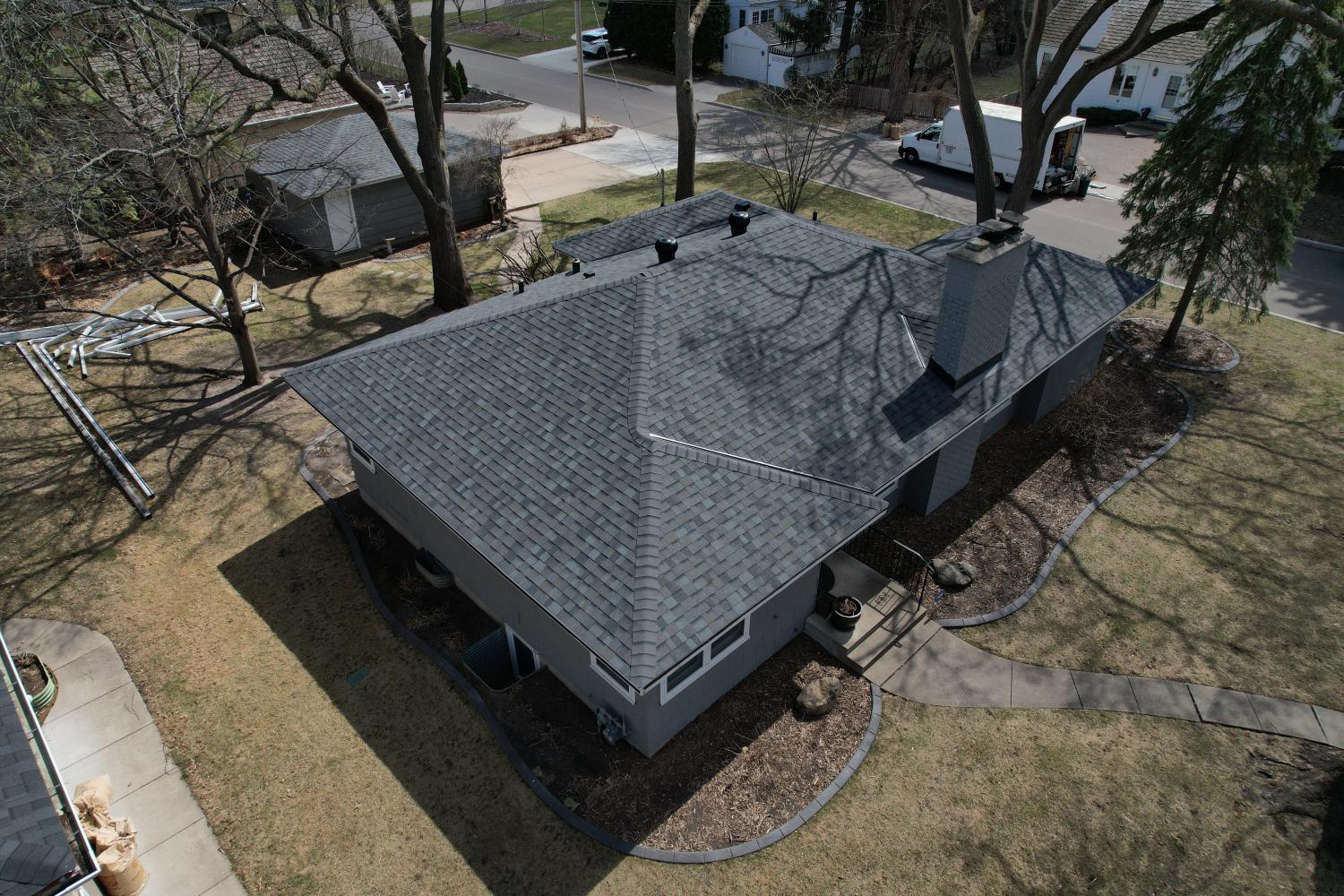 Hopkins Home Transformation: Roof, Siding, and Door Update