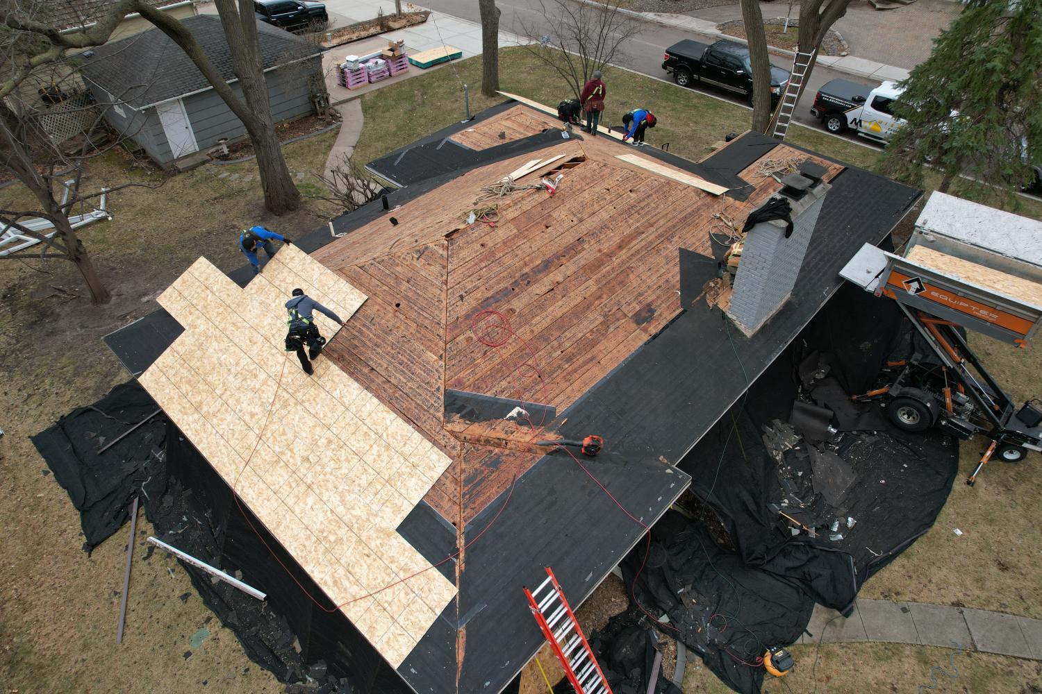 Hopkins Home Transformation: Roof, Siding, and Door Update
